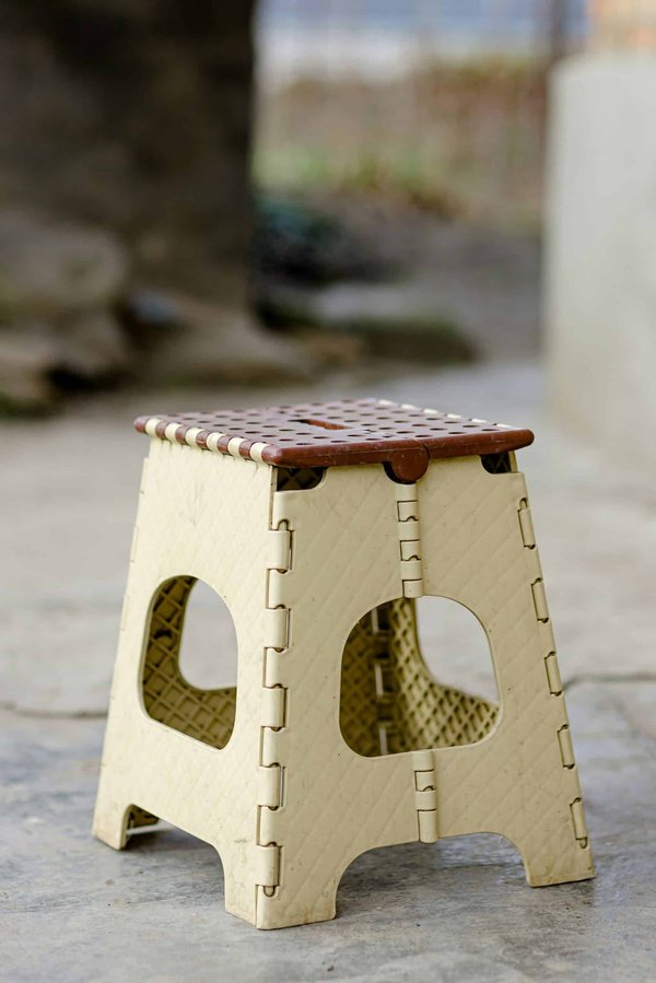 Tabouret pliant : il sert à quoi au juste ?